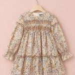 Vestido niña floral beige rosa y gris con lazo trasero