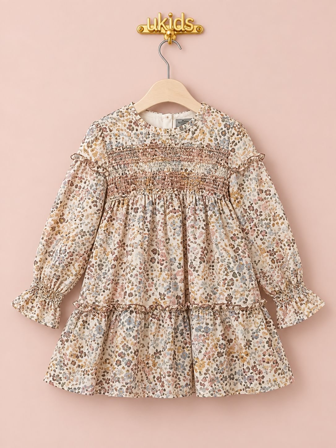 Vestido niña floral beige rosa y gris con lazo trasero